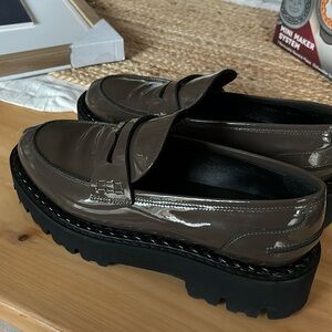 New, never worn Aquatalia brown women’s lug sole loafers 8.5 but fits like an 8.